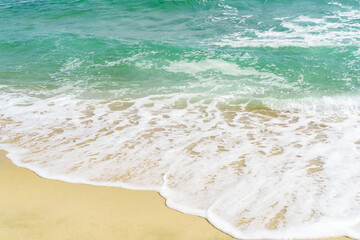 Sea waves and sandy beach. Relaxing concept photography background. High quality photo