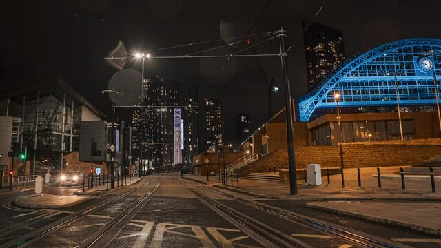 Timelapse view of the Manchester city at night. Train station in Manchester.