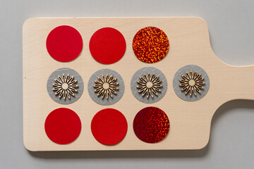 background pattern with glitter paper circles and wooden shapes