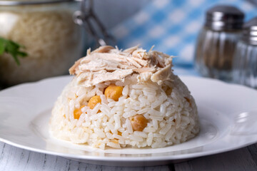 Traditional delicious Turkish food; Rice with chickpeas and chicken (Turkish name; Tavuklu nohutlu pilav or pilaf)