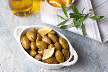 Cracked green olives. Cracked green olives with lemon. Turkish style olive (Turkish name; kirma zeytin)