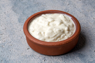 Homemade yogurt in a rustic bowl