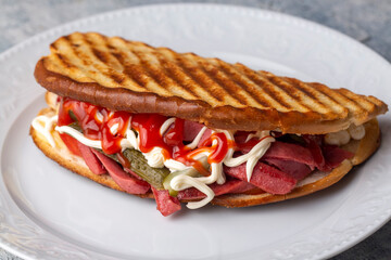 Serving Turkish traditional toast sandwich (Turkish name; Ayvalik tostu)