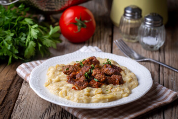 Turkish Food Hunkar Begendi made with Eggplant and Meat.