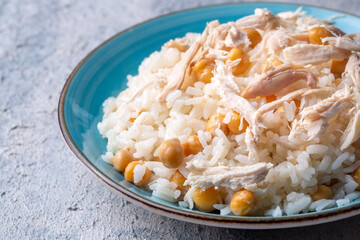Traditional delicious Turkish food; Rice with chickpeas and chicken (Turkish name; Tavuklu nohutlu pilav or pilaf)