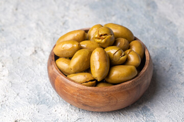 Cracked green olives. Cracked green olives with lemon. Turkish style olive (Turkish name; kirma zeytin)