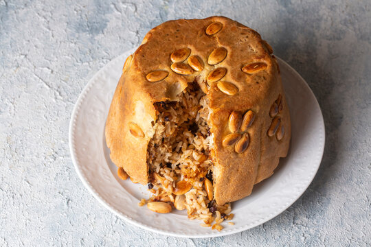 Turkish Perde Pilavi. Drape pilaf with chicken, almond and raisin. A local flavor Rice from Siirt region (Turkish name; Siirt perde pilavi)