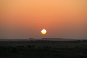Early sunrise coming over the mountains and valley floor in West Texas