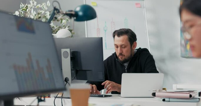 An ambitious, talented man who works in a newspaper office ponders the words, the text he is writing for a magazine, a reporter, a journalist is looking for a creative idea for an article