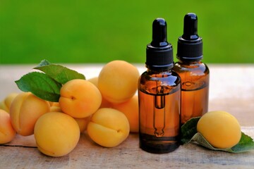Apricot kernel oil. Organic natural oil. Apricot oil in a glass bottle with a pipette . natural Apricot oil