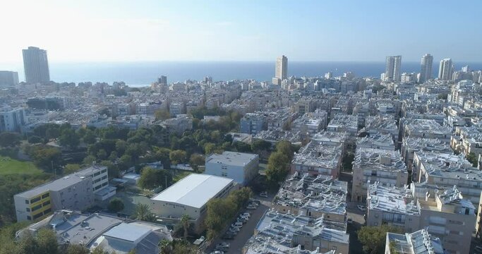 Aerial view of the coastal town of Bat Yam on the shores of the Mediterranean Sea as panorama skyline and urban seascape, Israel. Top view of residential city view middle east Buildings and streets