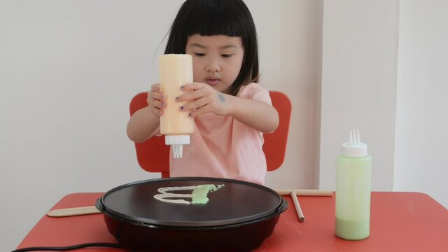 Kid enjoy making pancake in many design at home by itself.