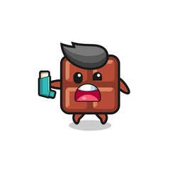 chocolate bar mascot having asthma while holding the inhaler