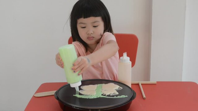 Kid enjoy making pancake in many design at home by itself.