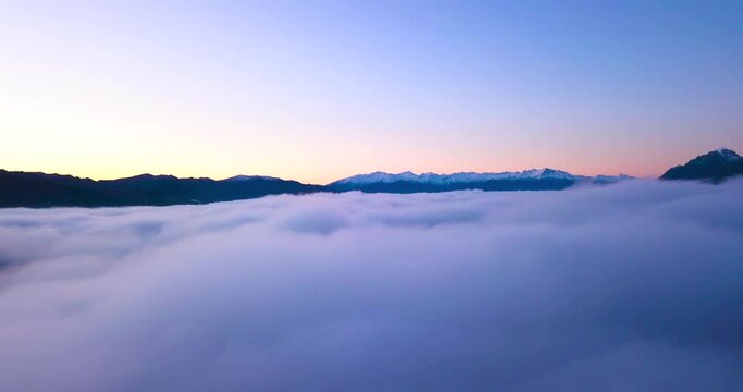 Flying Through Winter Clouds at beautiful Lake Hawea in New Zealand