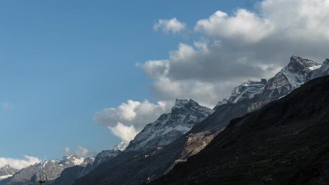 Time lapse of snow mountains. clouds moving on snow mountains at Himachal Pradesh, India.