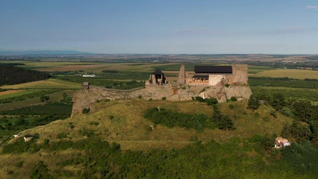 Wide drone footage of Boldogkō Castle on Lion's Rock in Hungary
