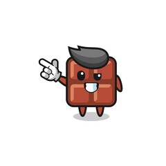 chocolate bar mascot pointing top left