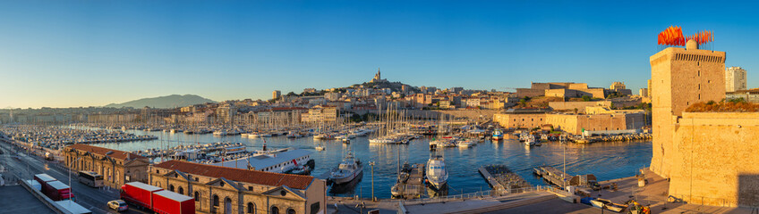 Fototapeta premium Marseille France, panorama city skyline at Vieux Port with Notre Dame de la Garde basilica