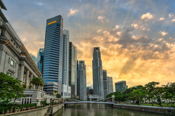 Singapore sunset city skyline at Boat Quay and Clarke Quay waterfront business district