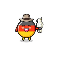 germany flag zookeeper mascot with a parrot