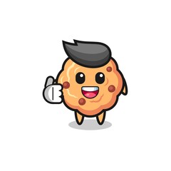 chocolate chip cookie mascot doing thumbs up gesture