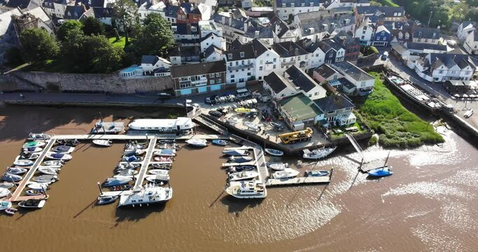 Scenic Aerial View Of Sailboats Moored In Marine Next To Topsham Quay. Dolly Right