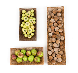 Terminalia bellirica , terminalia chebula and phyllanthus emblica or triphala isolated on white background.top view ,flat lay.