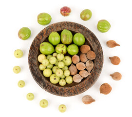 Terminalia bellirica , terminalia chebula and phyllanthus emblica or triphala isolated on white background.top view ,flat lay.