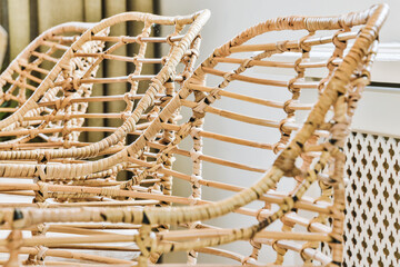 Wicker bamboo chairs in luxury dining room