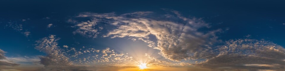 Dark blue sunset sky pano with Cumulus clouds. Seamless hdr panorama in spherical equirectangular format. Complete zenith for 3D visualization, game and sky replacement for aerial drone 360 panoramas.
