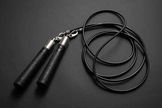 Jumping rope on dark background