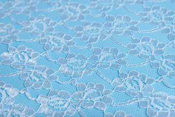 Blue fabric background. Lace background. Selective focus. A place to copy