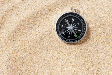 compass on sand