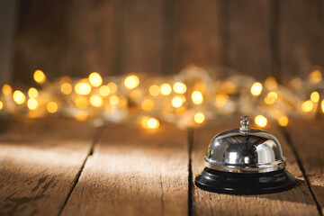 Bell of service with bokeh Christmas lighting background