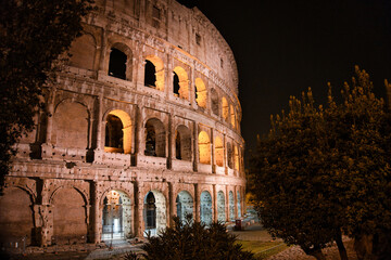 Colosseum in Rome in the night. travel directions and rest in Italy. Europe sightseeing landmarks...