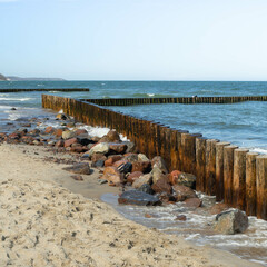 Breakwater and tetrapods by the sea 