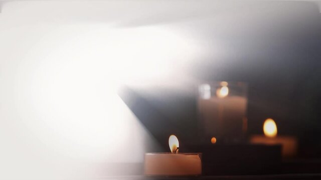 Holy time with enchanting light, prayer and meditation, and soft candles