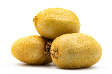 Fototapeta premium Kiwi on a white background. In combination with the shade of ripe kiwi. close up