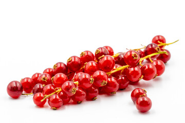 Redcurrant on a white background. Along with the mature Redcurrant shade. close up
