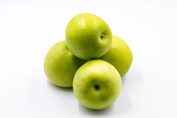 Sour apples on a white background. Ripe Green combined with a shade of sour apple. close up