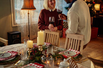 Diverse couple celebrating Christmas at home