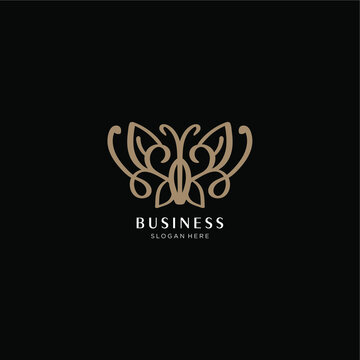 abstract butterfly logo. line art abstract gold color black background