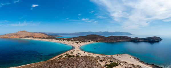 Obraz premium Elafonisos Greek island, Simos double beach panorama, aerial drone view. Peloponnese. Greece.