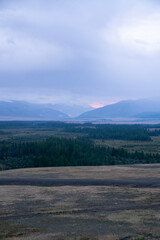 Obraz premium Mountains, forest and steppe at dawn