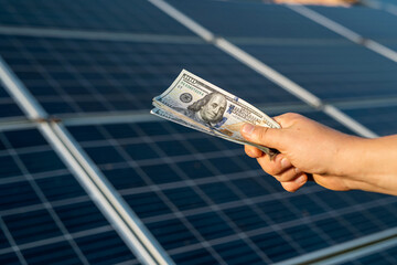 Saving money with sun energy and solar panels - obrazy, fototapety, plakaty