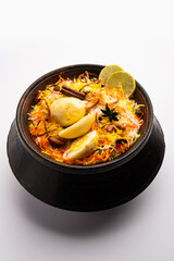 Anda biryani or egg biryani served in handi or plate