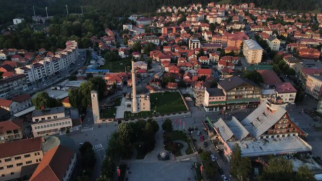 Pljevlja, Montenegro. Aerial View of Downtown Square, Mosque and Residential Buildings at Sunset Sunlight, Drone Shot