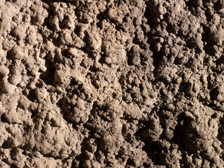 Old plastered wall texture. Brown tone background.