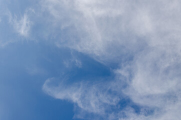 fluffy cloud and deep blue sky background